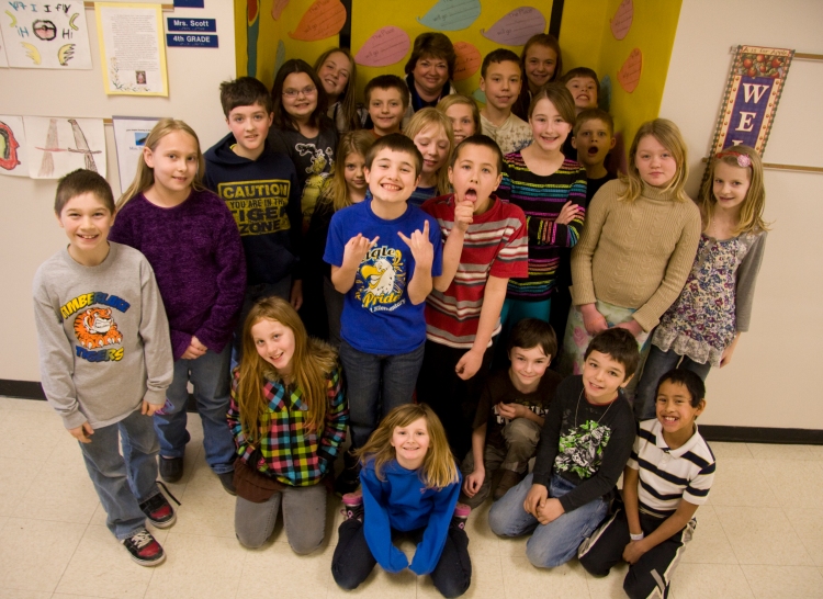 Fourth-graders from Athol Elementary celebrate completing the Coeur d’Alene Press’ Design an Ad program on March 5.